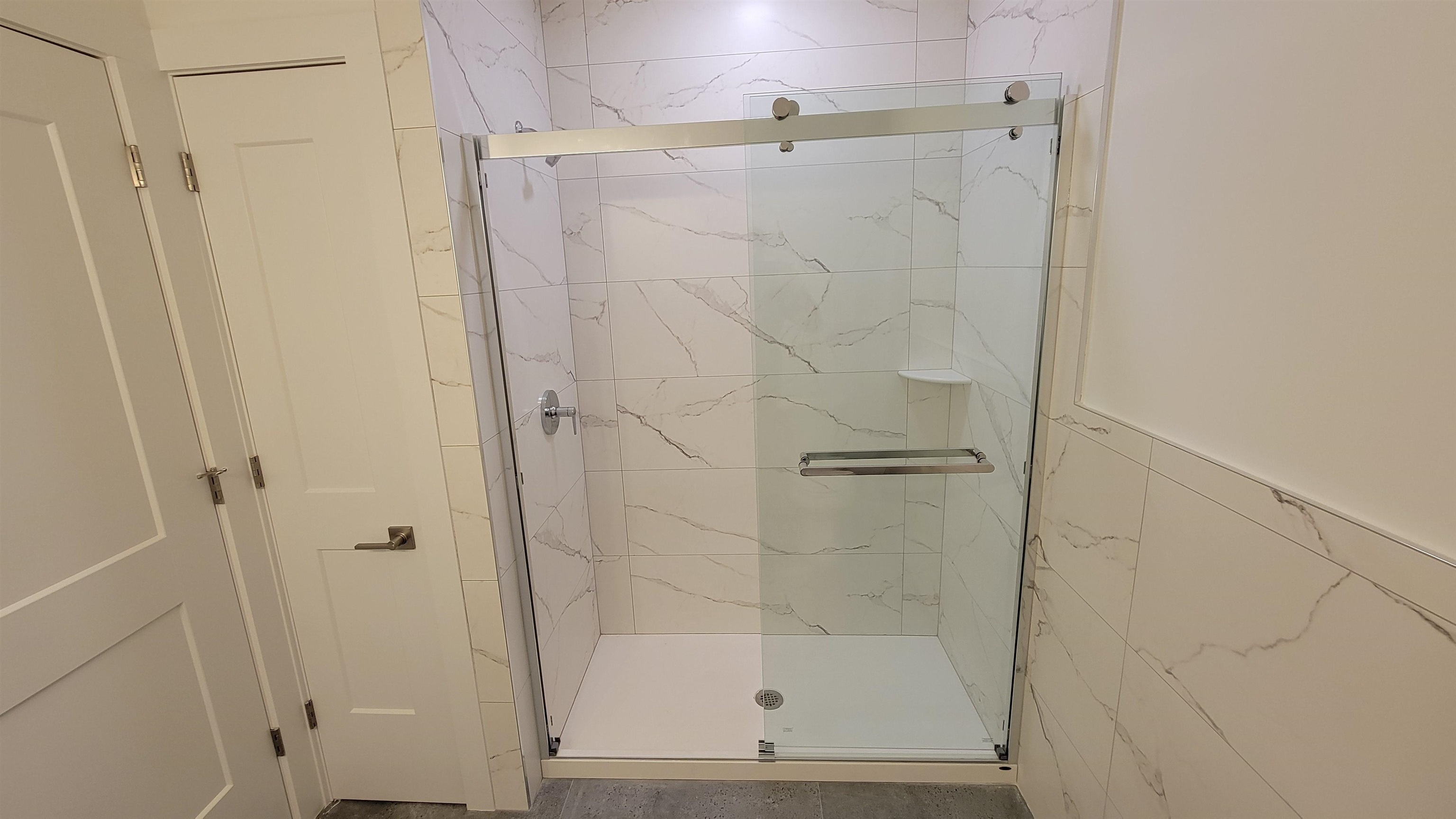 228 Park Avenue, Unit 305 East Rutherford, NJ 07073 - Photo 6 of 11 a bathroom with a shower