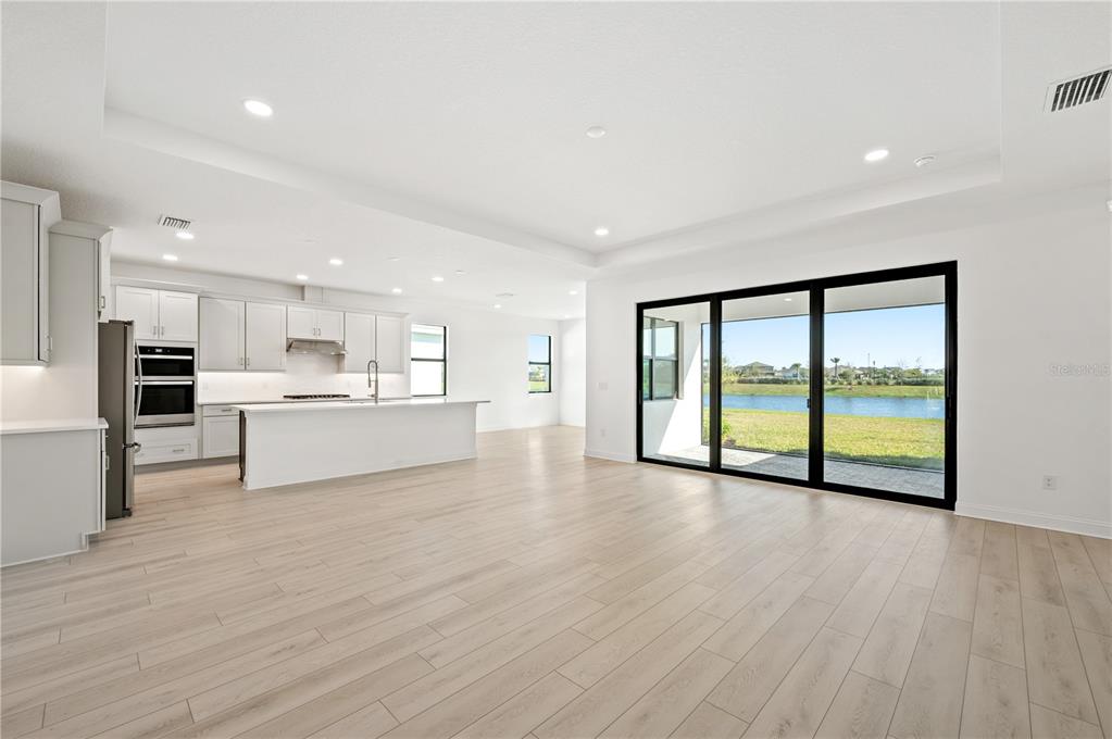 5830 Freestone Circle Apollo Beach, FL 33572 - Photo 14 of 34 a view of a kitchen with a sink and a large window