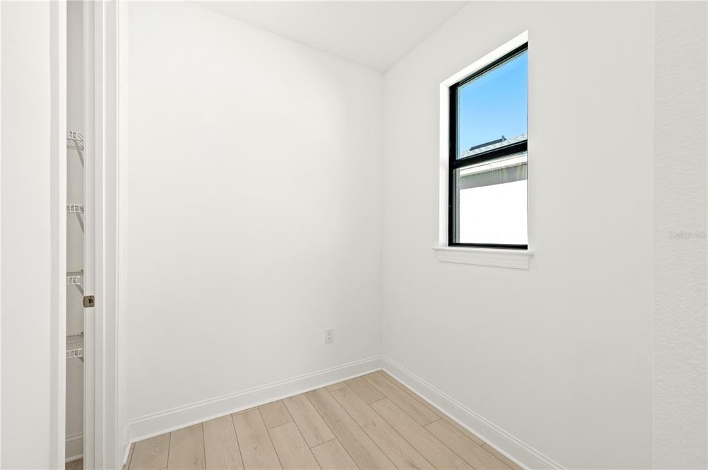 5830 Freestone Circle Apollo Beach, FL 33572 - Photo 24 of 34 a view of a small space with wooden floor