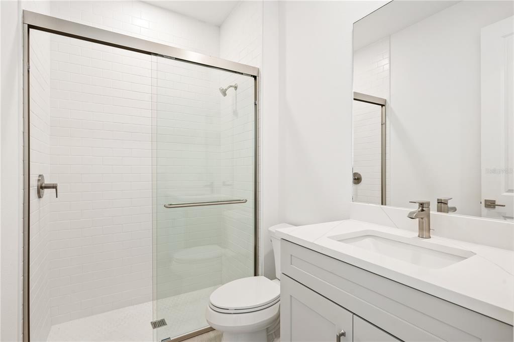 5830 Freestone Circle Apollo Beach, FL 33572 - Photo 26 of 34 a bathroom with a sink toilet and shower