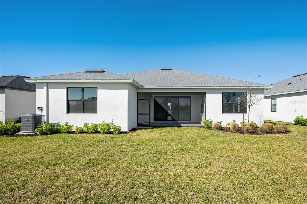 5830 Freestone Circle Apollo Beach, FL 33572 - Photo 29 of 34 a front view of a house with a yard