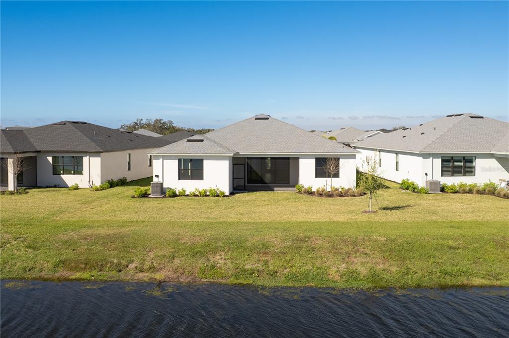 5830 Freestone Circle Apollo Beach, FL 33572 - Photo 30 of 34 a front view of a house with a garden