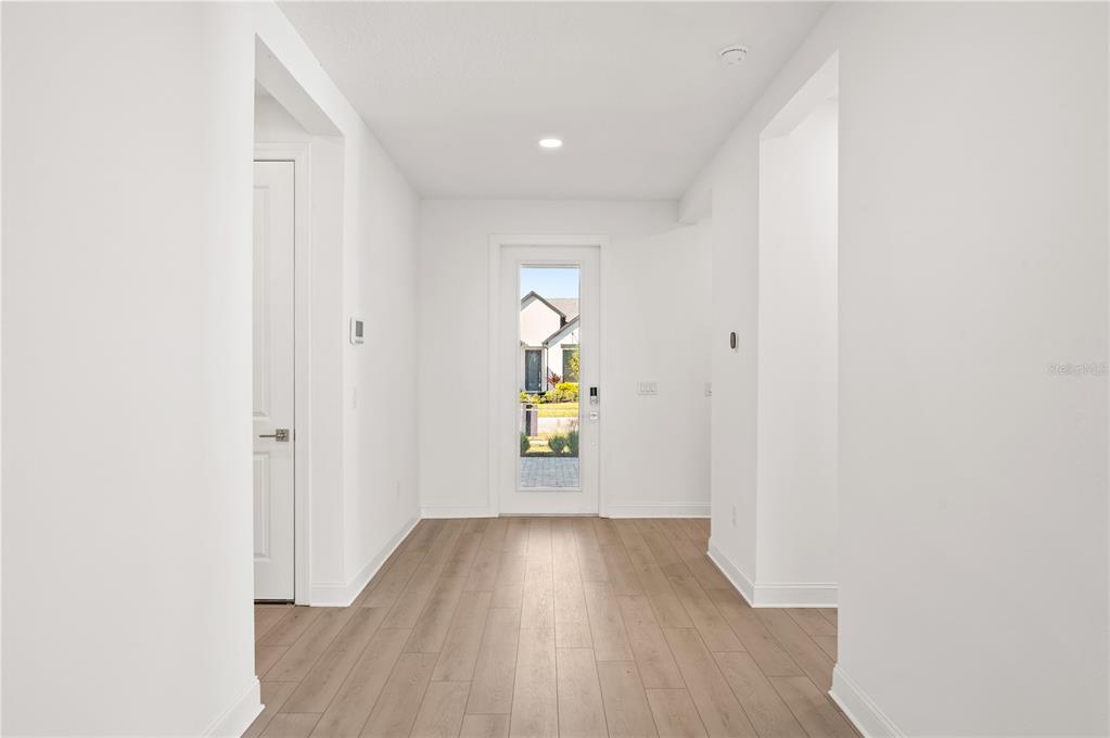 5830 Freestone Circle Apollo Beach, FL 33572 - Photo 6 of 34 a view of empty room with wooden floor