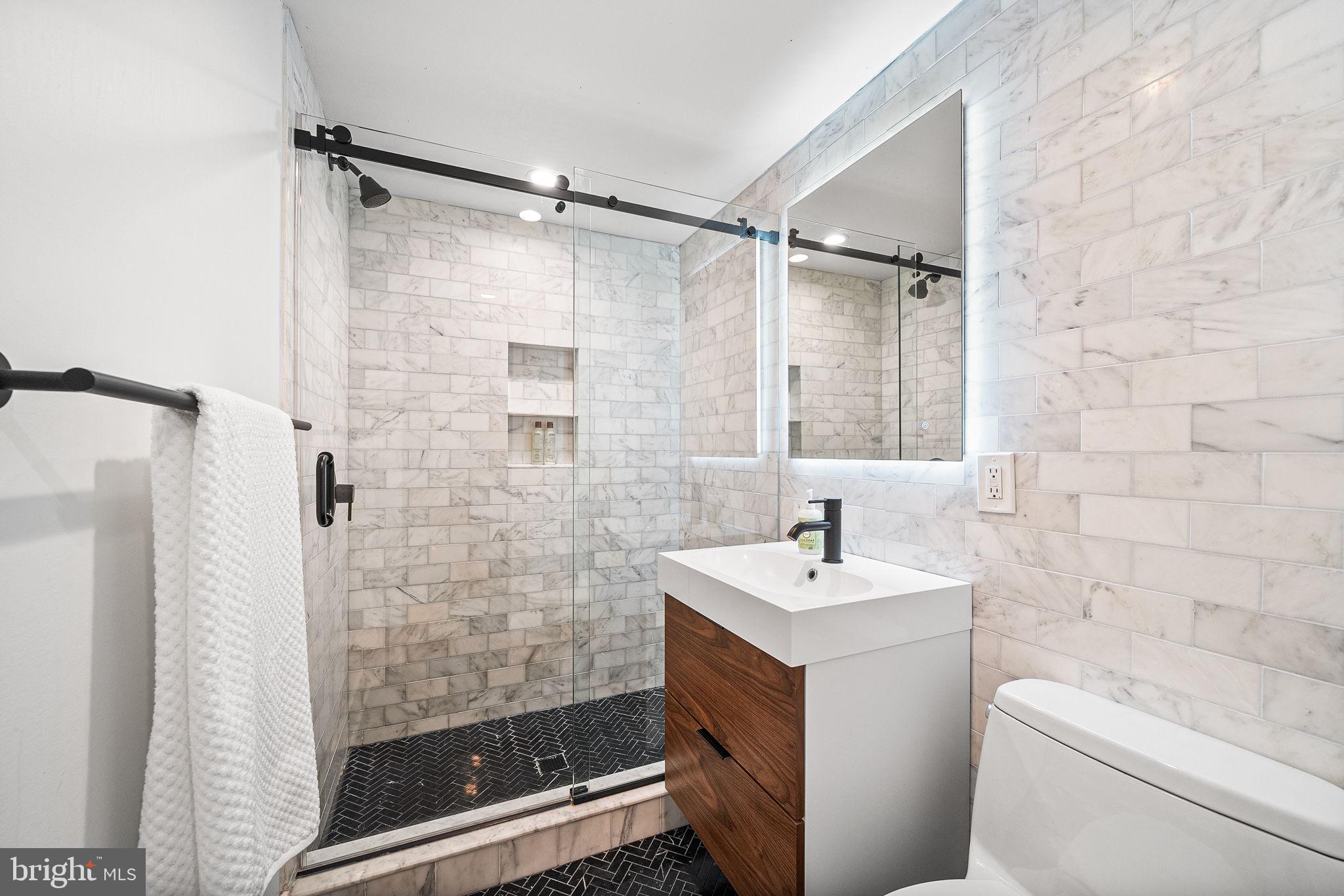 3624 Warren Street Northwest Washington, DC 20008 - Photo 42 of 77 Full lower level bathroom