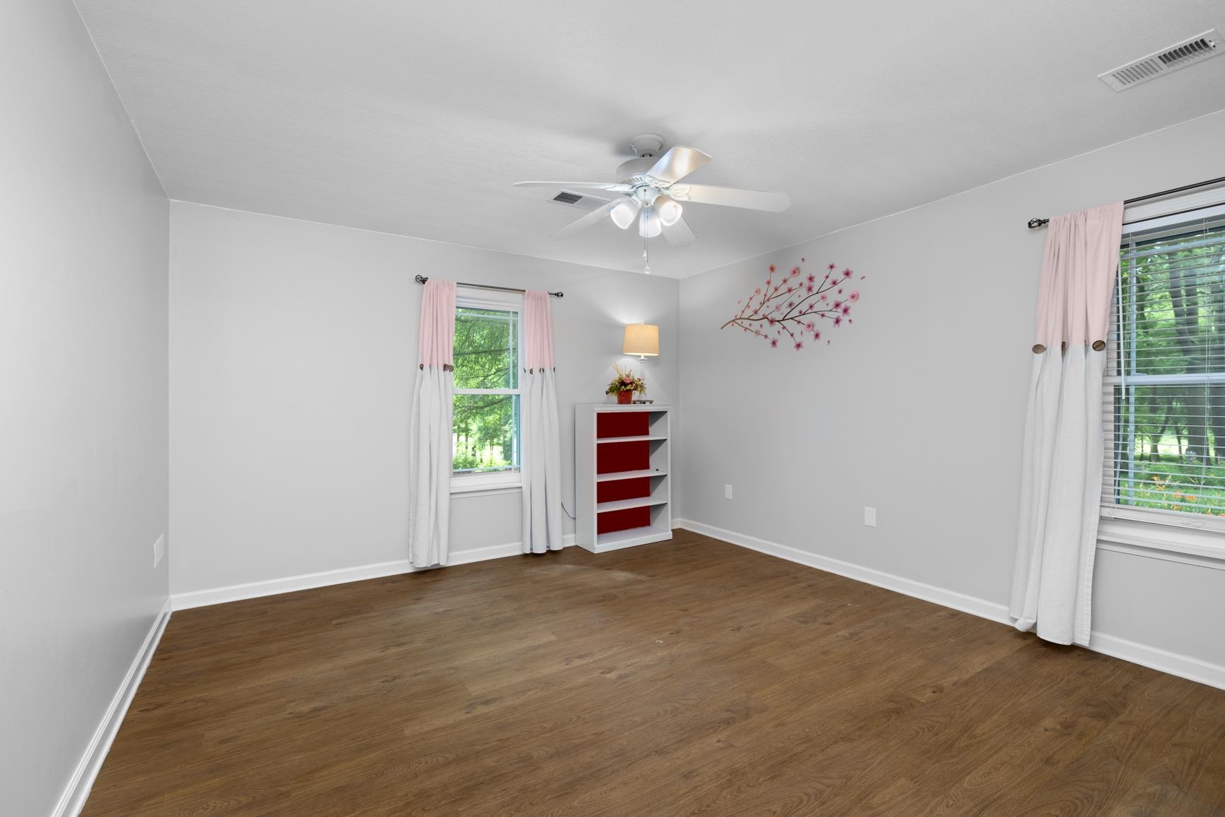 6639 Old Millington Road Millington, TN 38053 - Photo 14 of 40 Just across the hall from the primary bedroom, good sized room with a nice closet.