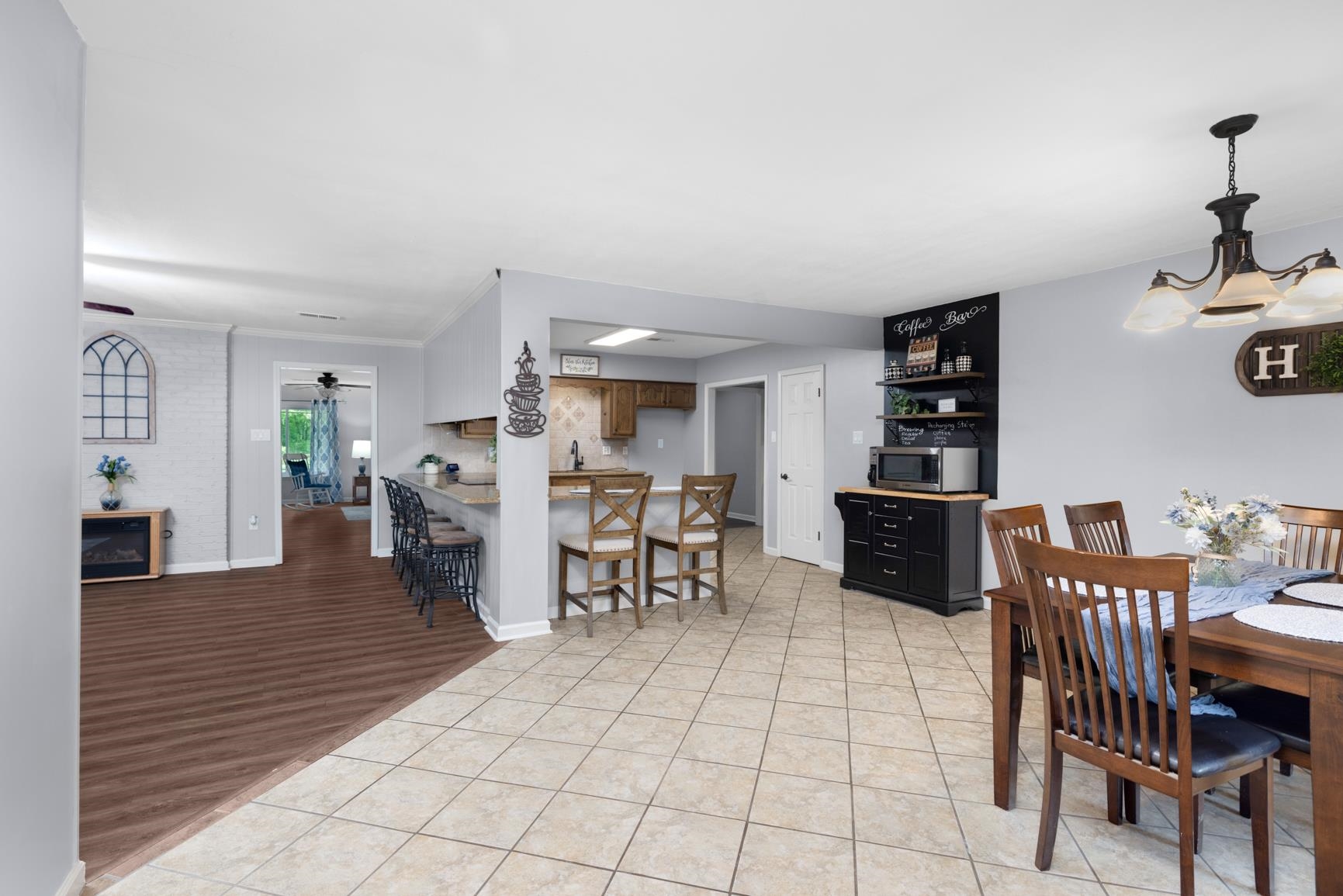 6639 Old Millington Road Millington, TN 38053 - Photo 29 of 40 Seating areas along both sides of the countertops along with plenty of space for a table and chairs providing extra seating for dining. Coffee bar included.