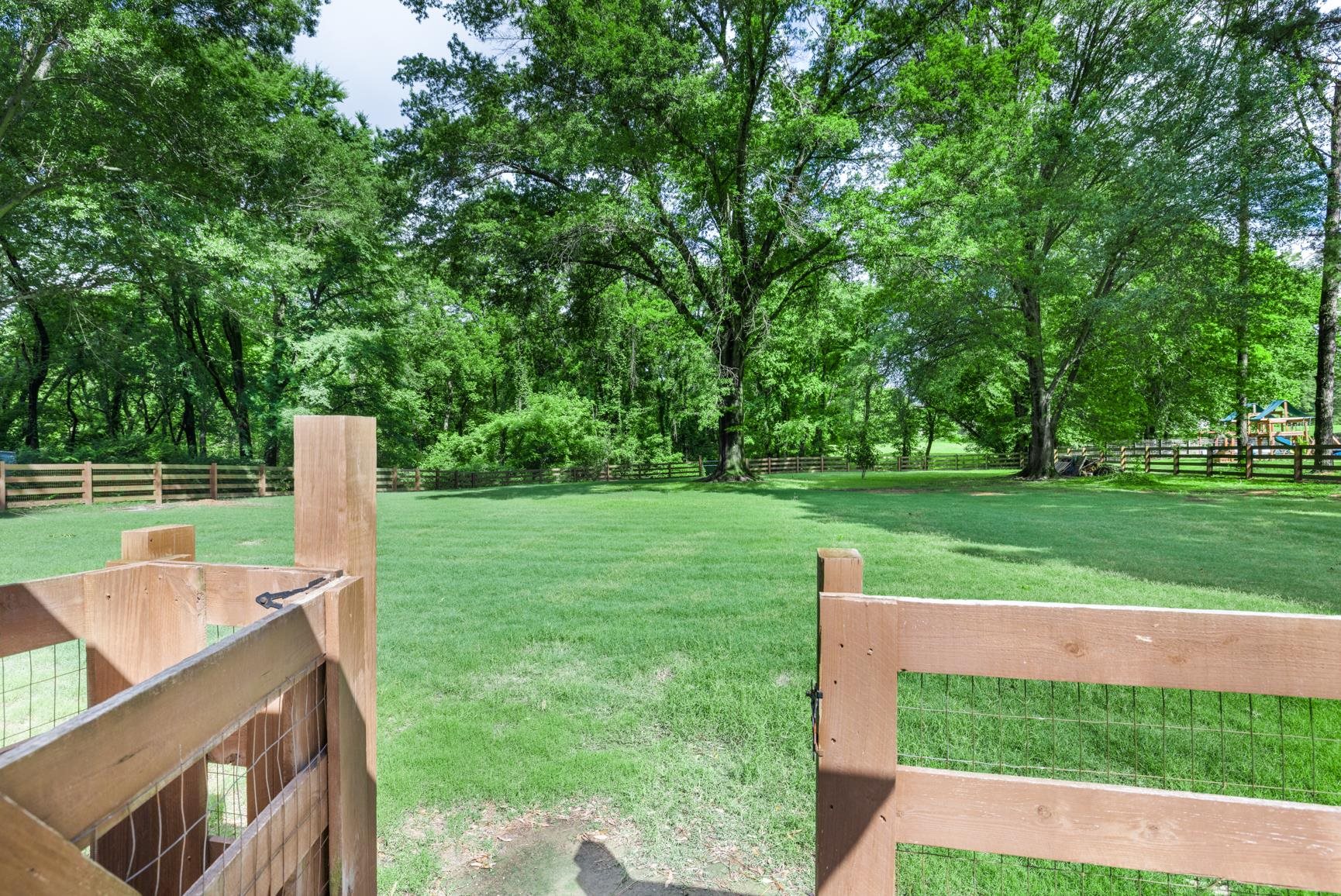 6639 Old Millington Road Millington, TN 38053 - Photo 34 of 40 View of backyard from the fence. Perfect for pets, hosting, or playing.