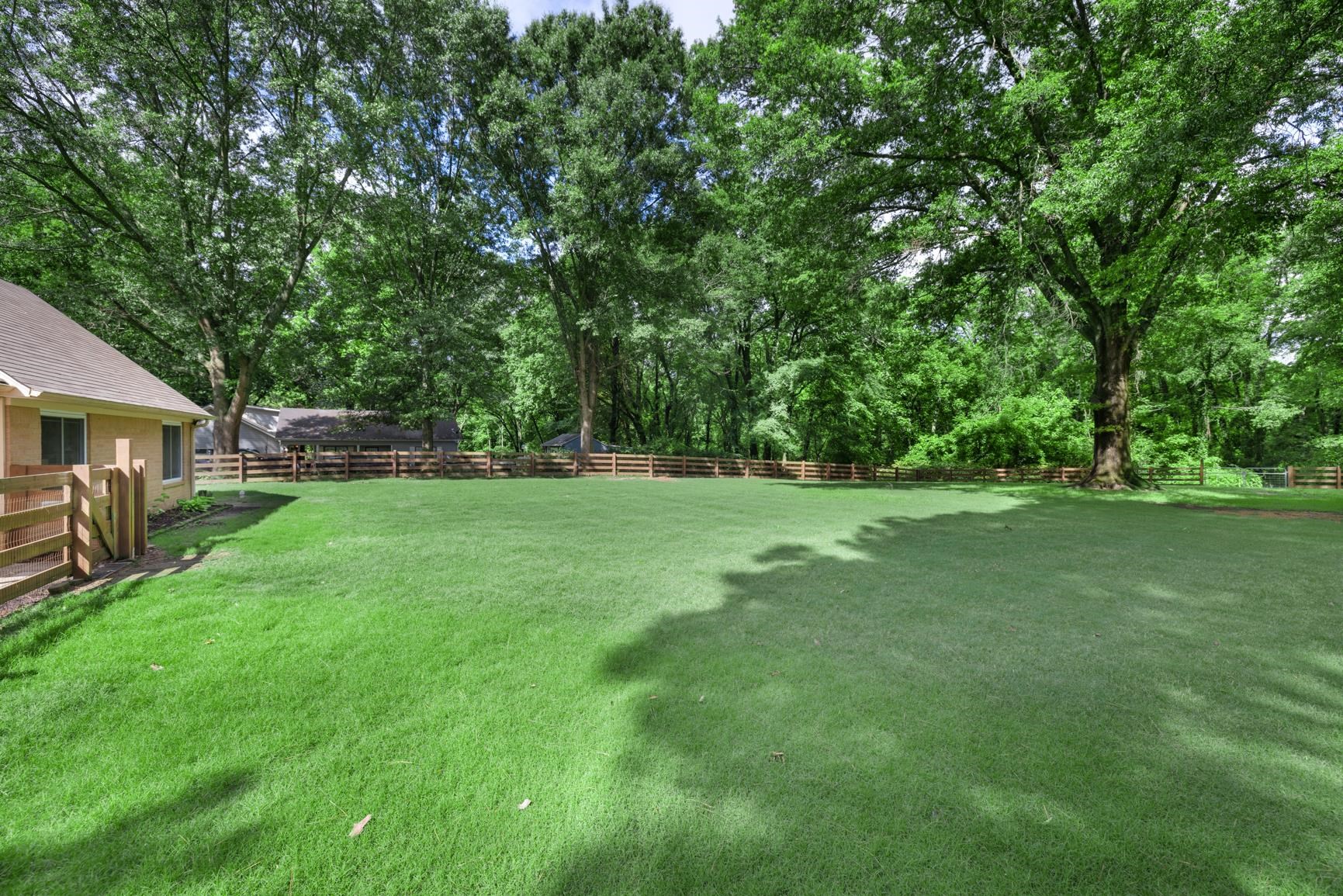 6639 Old Millington Road Millington, TN 38053 - Photo 35 of 40 A bigger view of the 3/4 of an acre that is fenced in the backyard.