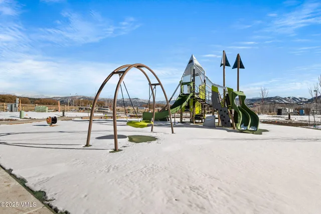 a view of swimming pool with a sitting area