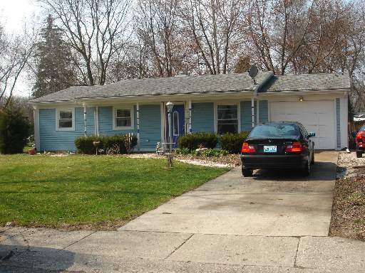 30 Surrey Road Montgomery, IL 60538 - Photo 1 of 1 a house view with a garden space