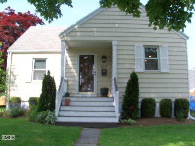 427 Reef Road Fairfield, CT 06824 - Photo 1 of 1 a front view of a house with garden
