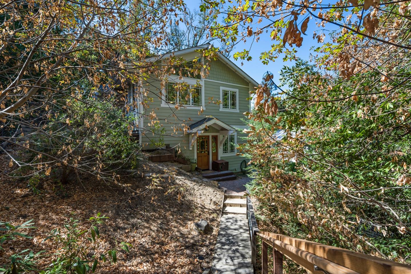 1975 Cordilleras Road Redwood City, CA 94062 - Photo 2 of 39 a front view of a house with a yard