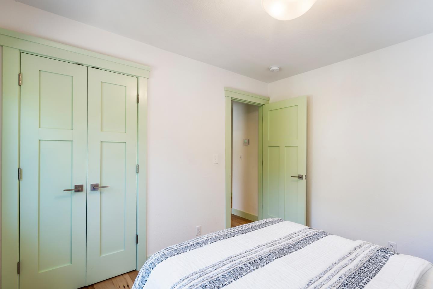 1975 Cordilleras Road Redwood City, CA 94062 - Photo 23 of 39 a bedroom with a bed and a shower