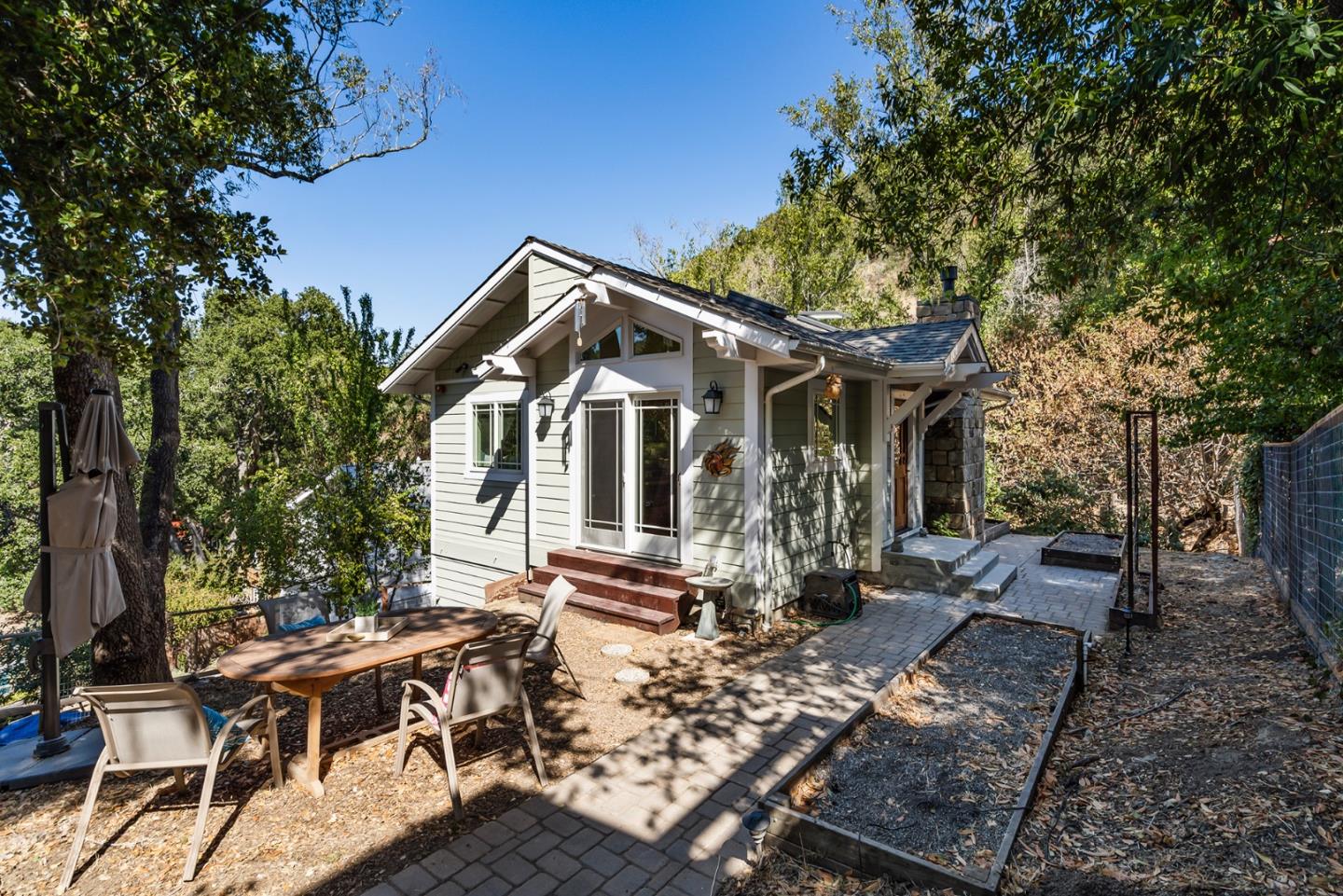 1975 Cordilleras Road Redwood City, CA 94062 - Photo 32 of 39 a front view of a house with garden