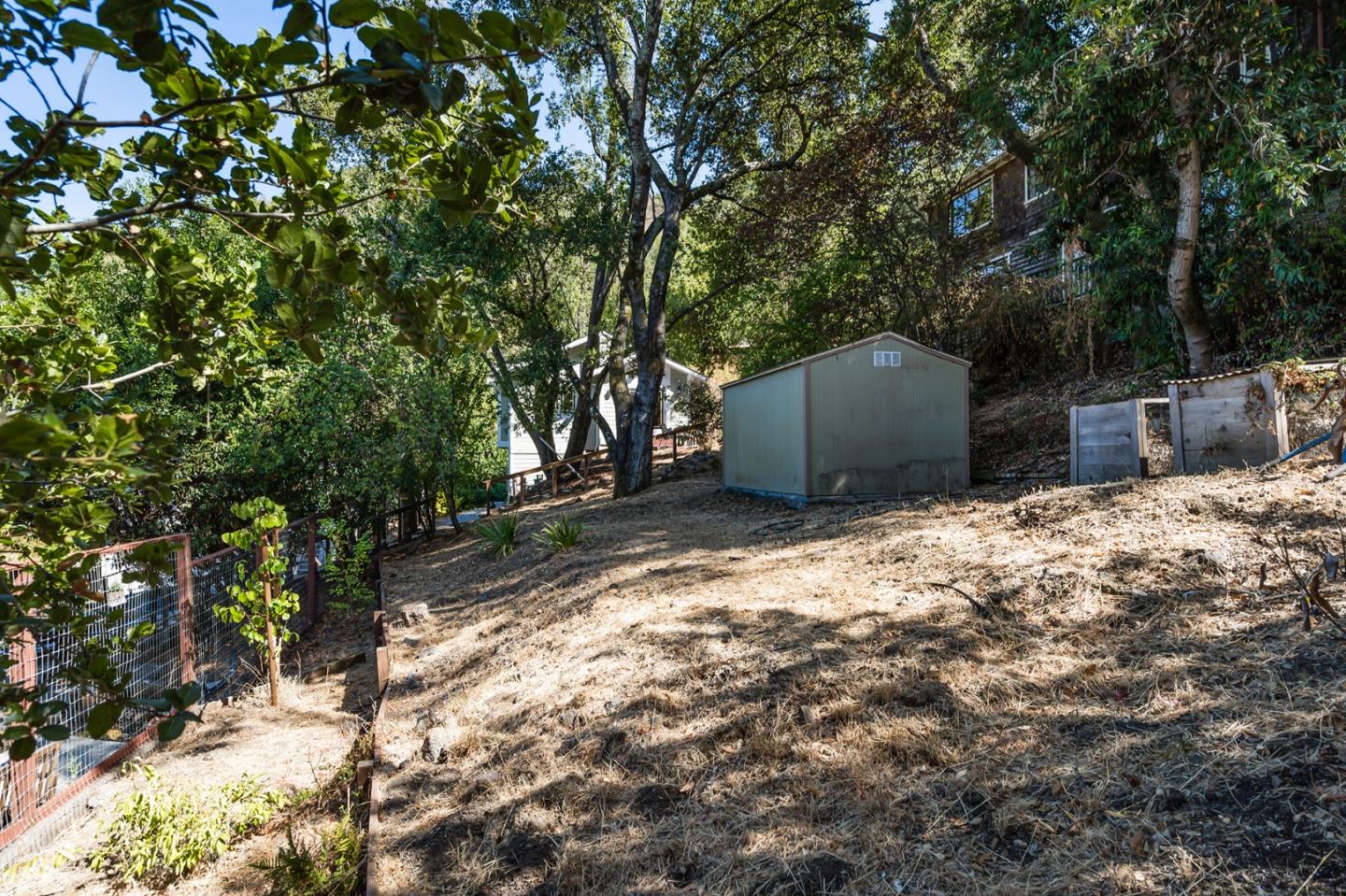 1975 Cordilleras Road Redwood City, CA 94062 - Photo 34 of 39 a backyard of a house with lots of green space