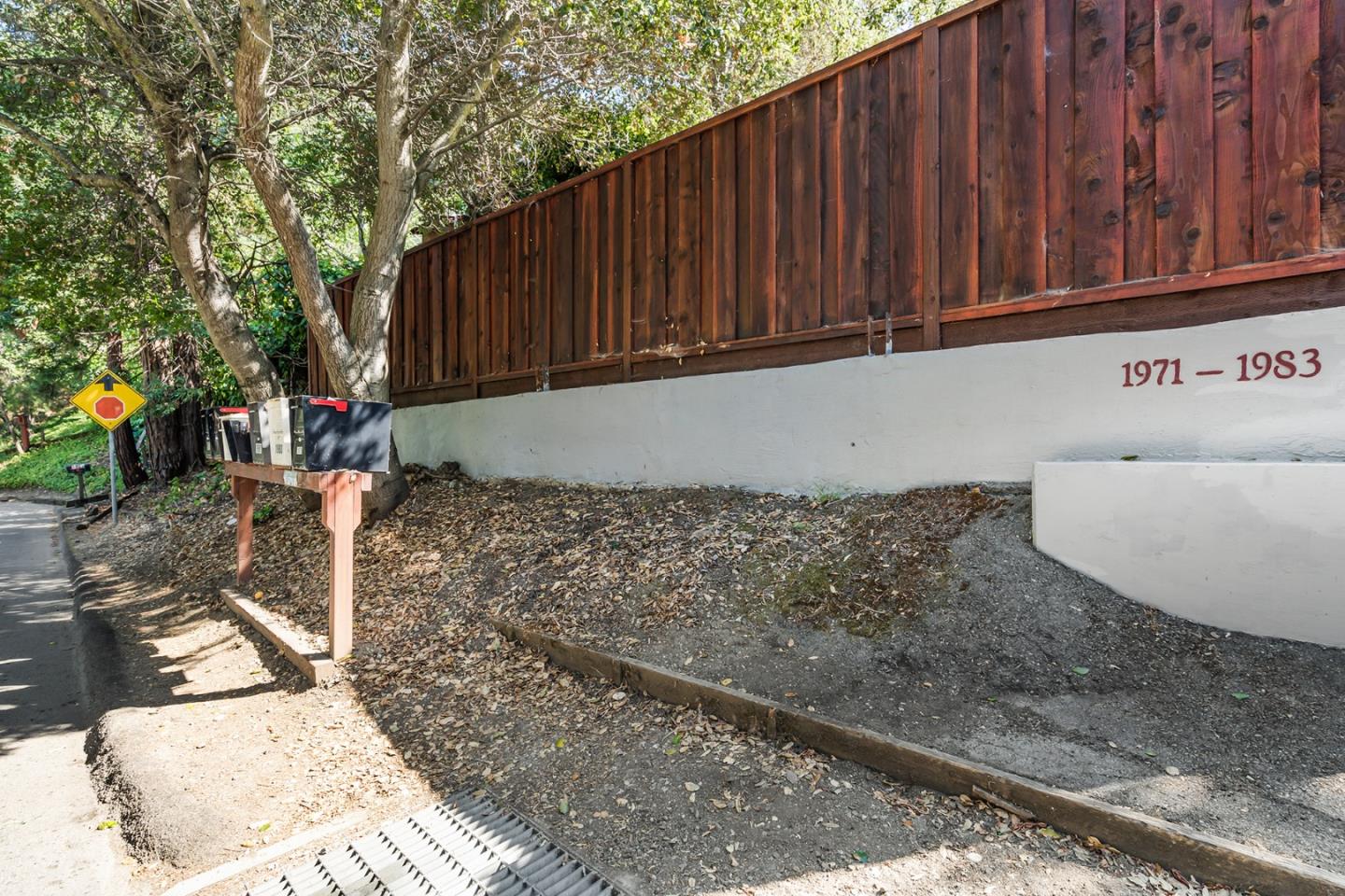 1975 Cordilleras Road Redwood City, CA 94062 - Photo 36 of 39 a view of a backyard with wooden fence