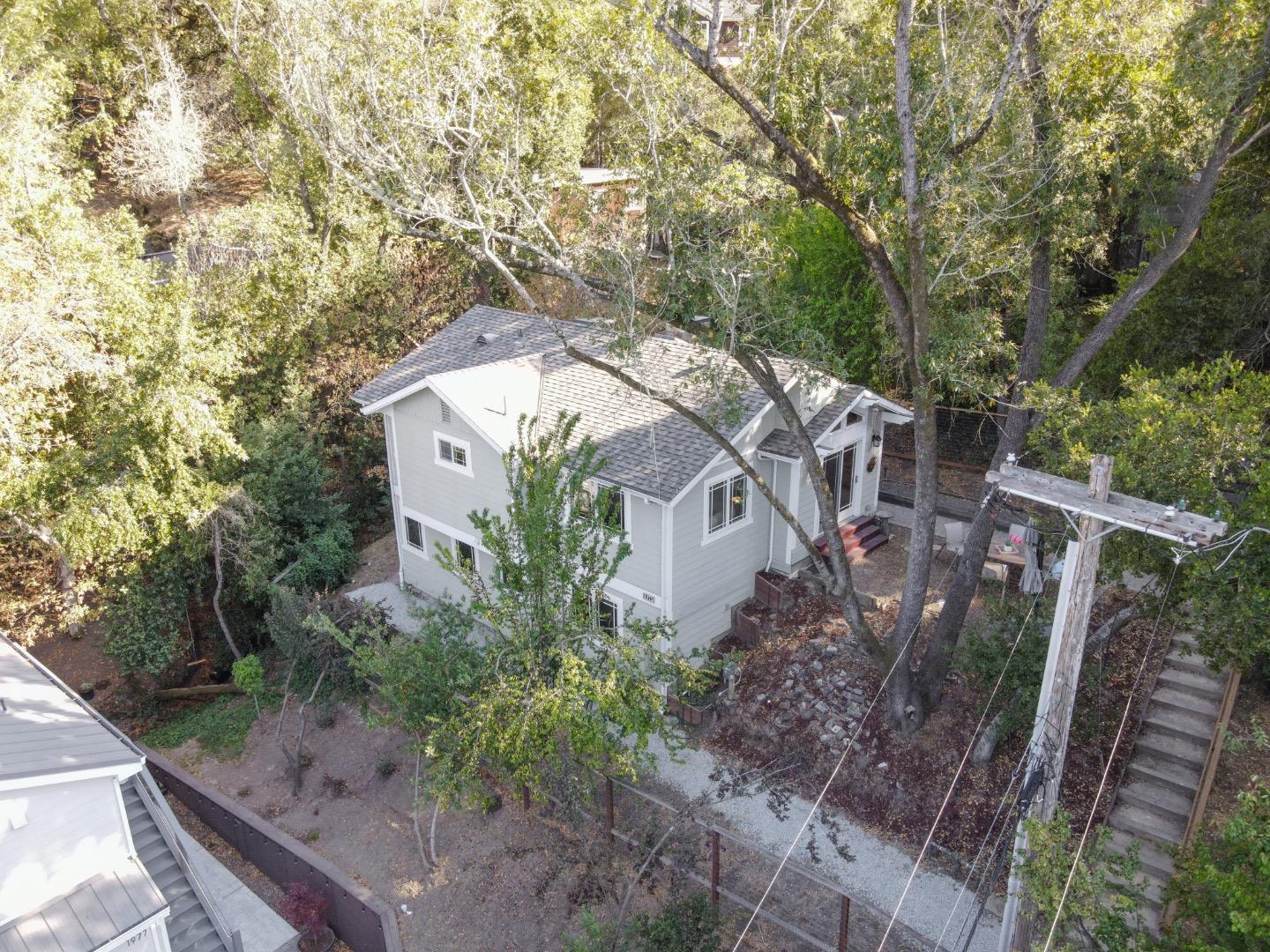 1975 Cordilleras Road Redwood City, CA 94062 - Photo 37 of 39 a house with trees in front of it