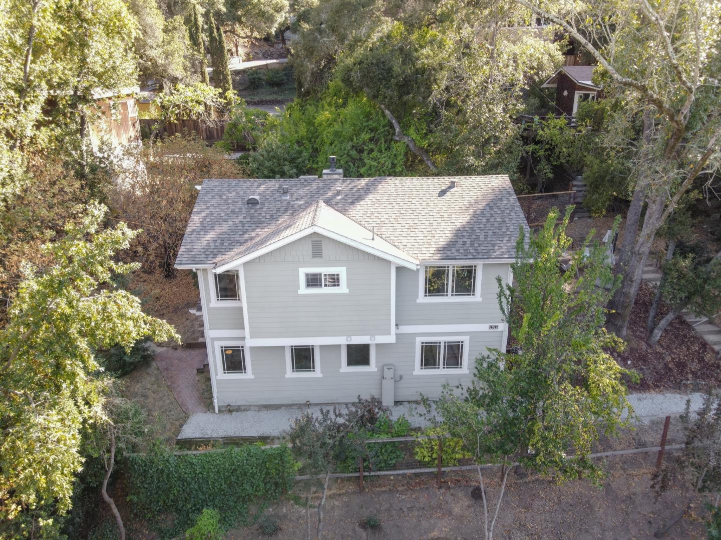 1975 Cordilleras Road Redwood City, CA 94062 - Photo 38 of 39 front view of a house with a yard