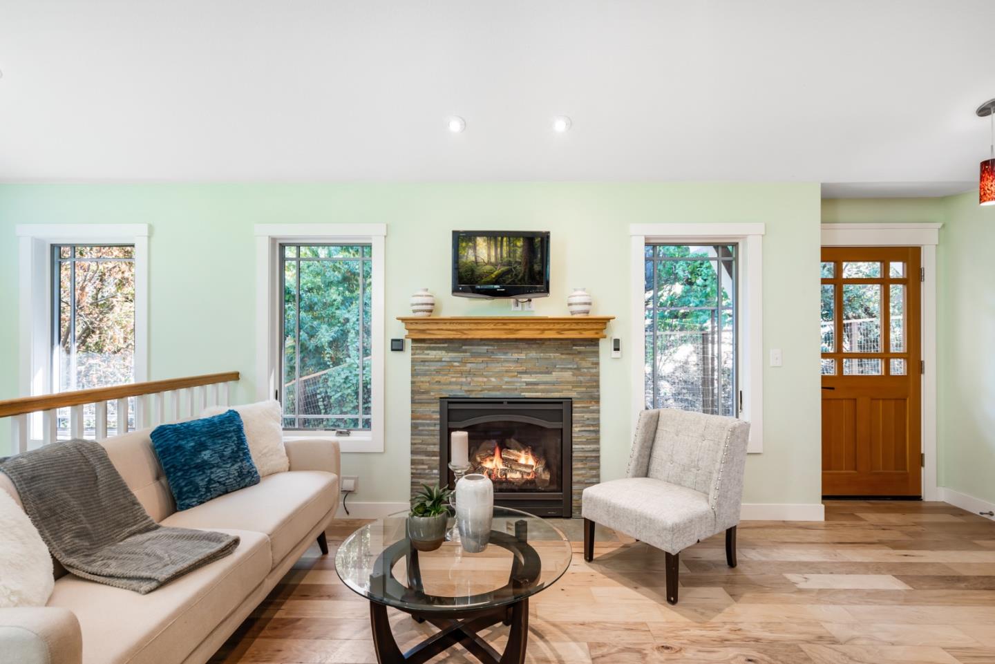 1975 Cordilleras Road Redwood City, CA 94062 - Photo 6 of 39 a living room with furniture and a fireplace