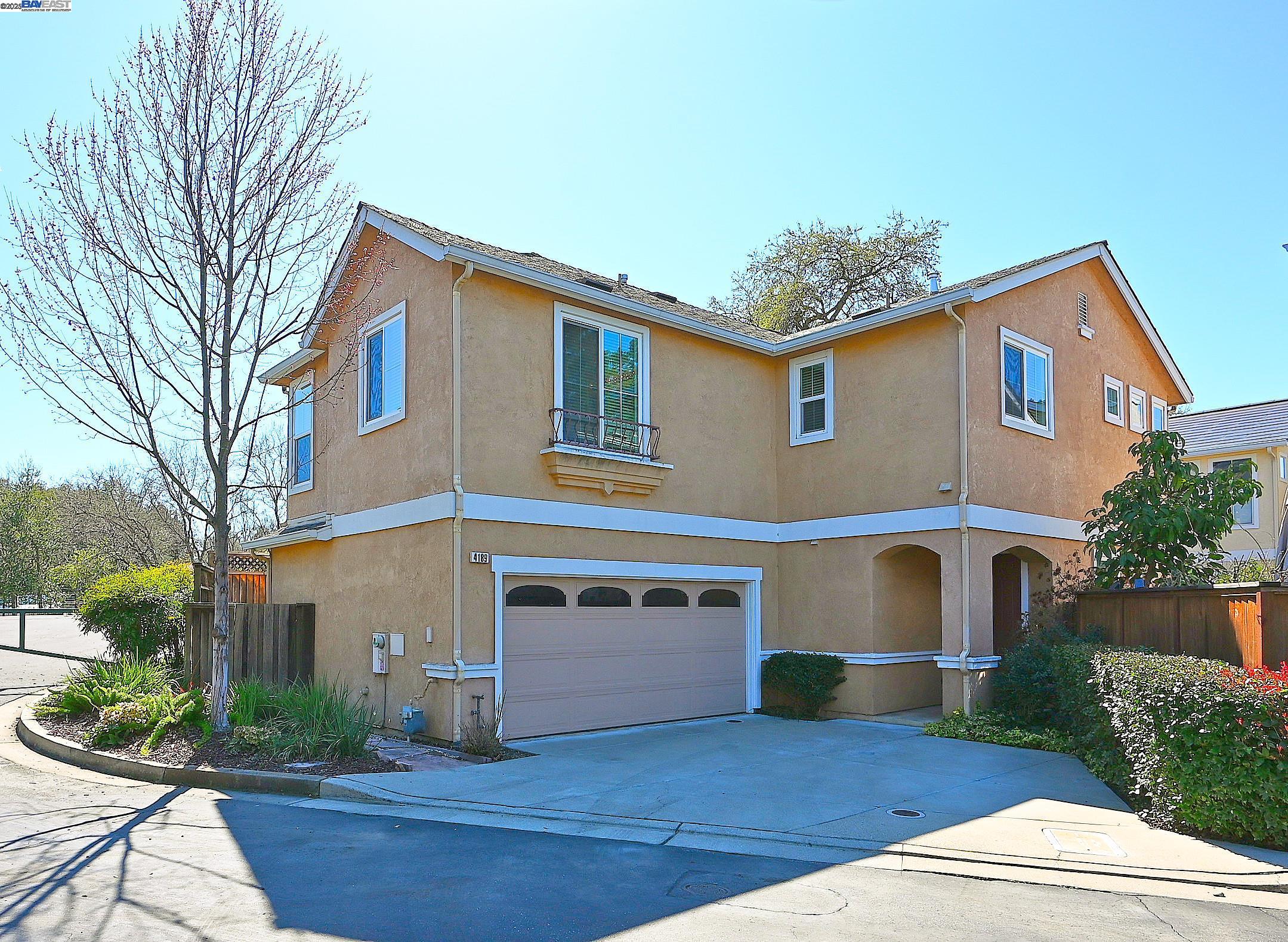4189 Tessa Place Pleasanton, CA 94566 - Photo 1 of 41 a front view of house with yard and green space