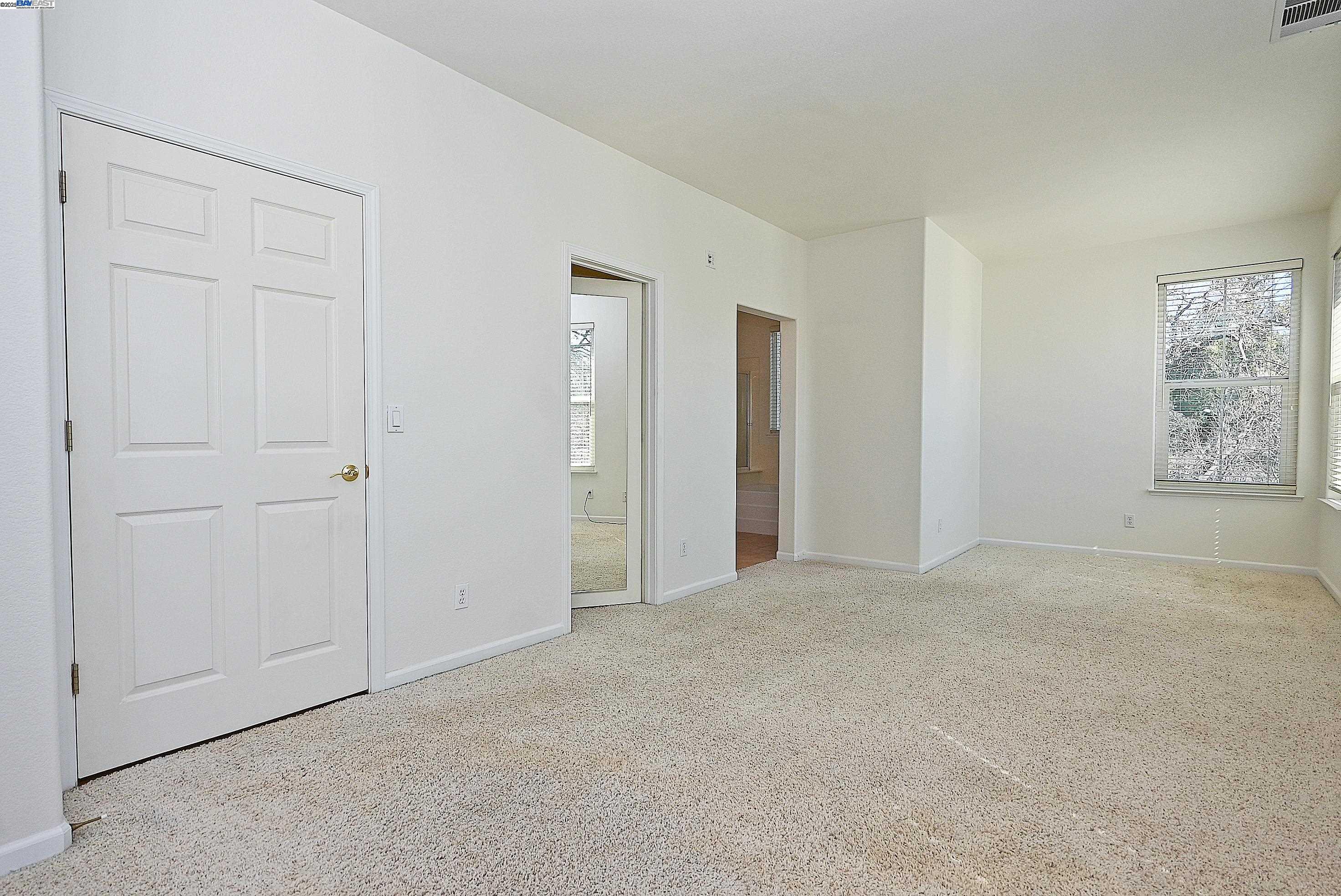 4189 Tessa Place Pleasanton, CA 94566 - Photo 18 of 41 an empty room with windows and closet
