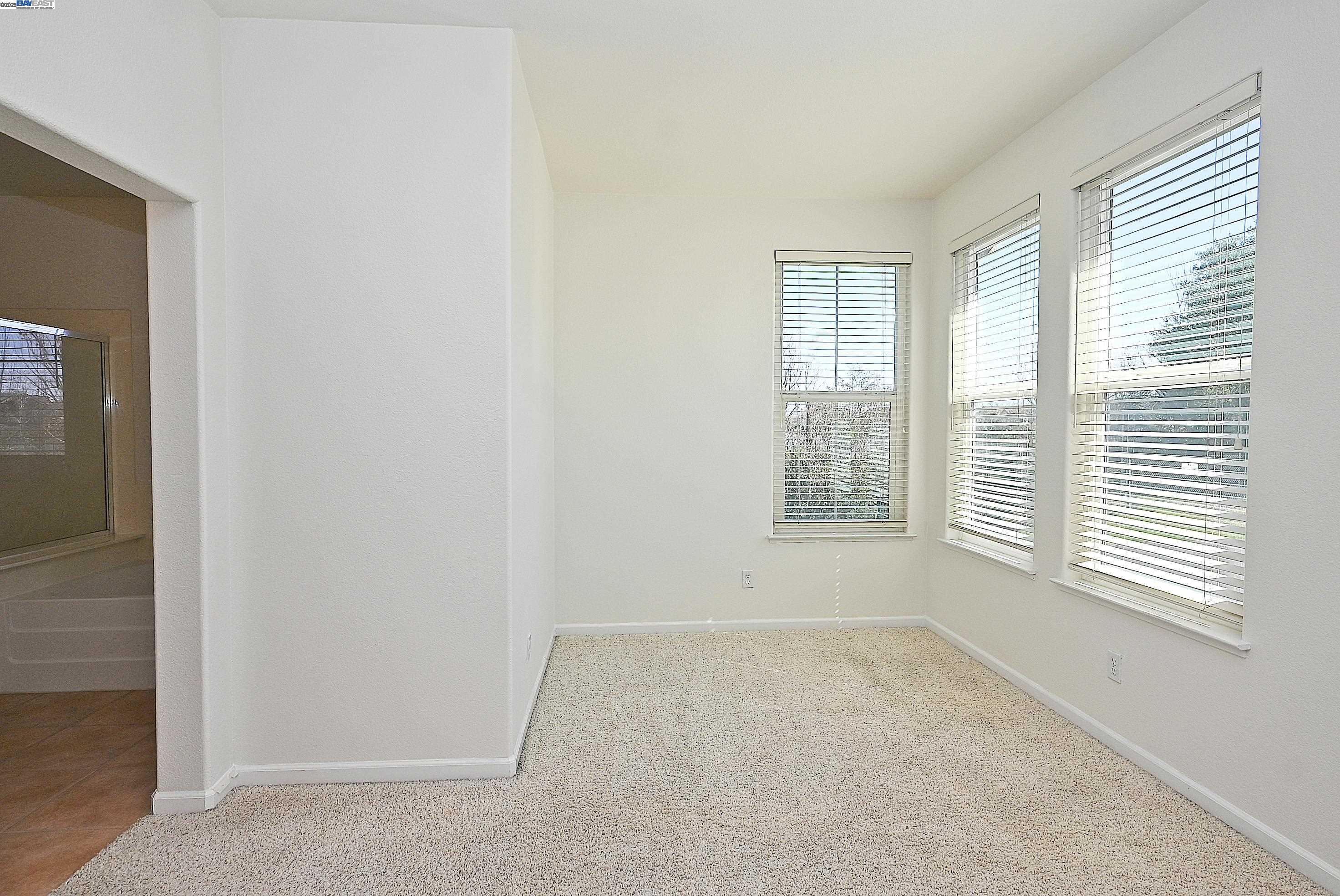 4189 Tessa Place Pleasanton, CA 94566 - Photo 20 of 41 a view of an empty room with a window