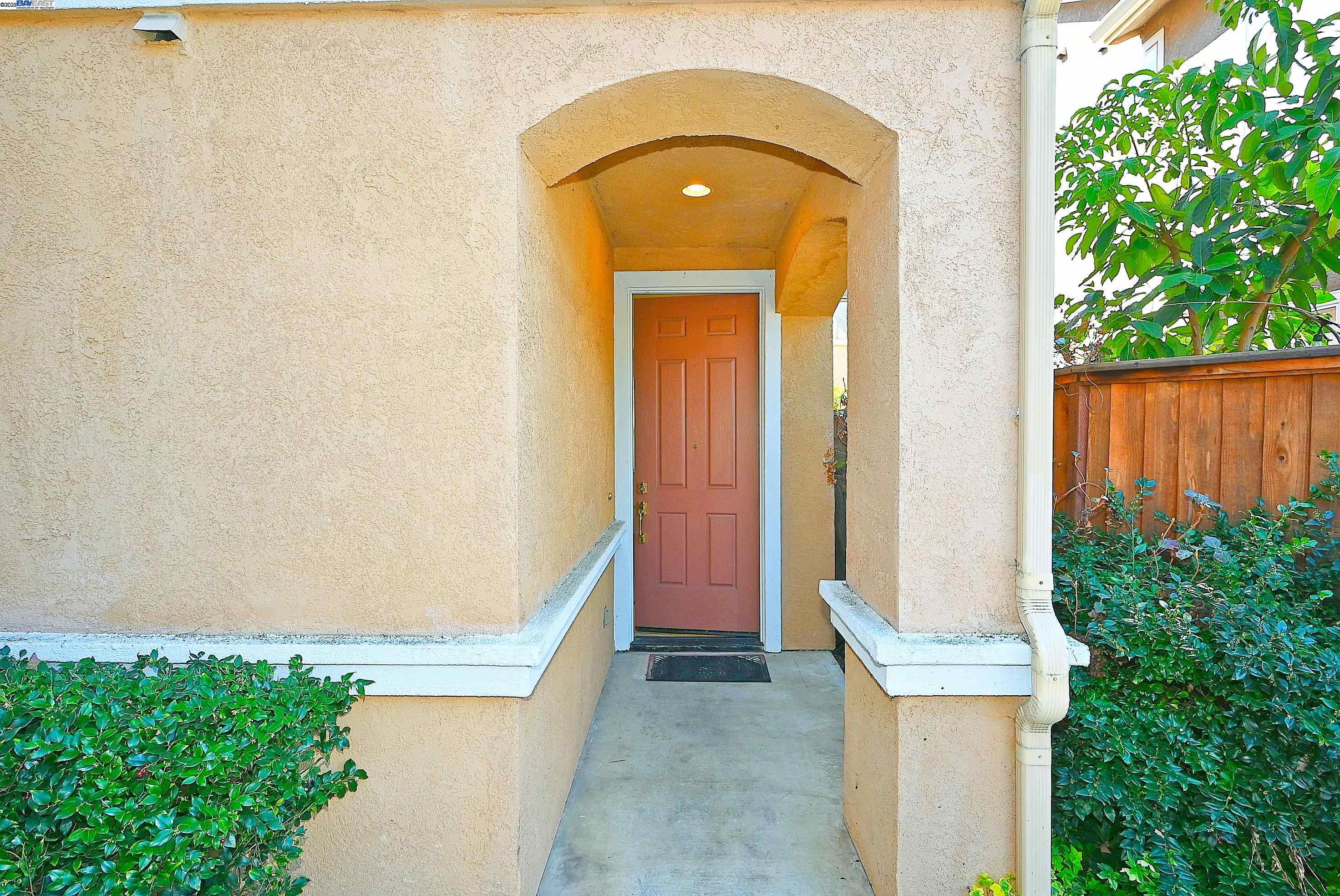 4189 Tessa Place Pleasanton, CA 94566 - Photo 2 of 41 a front view of a house with a garden