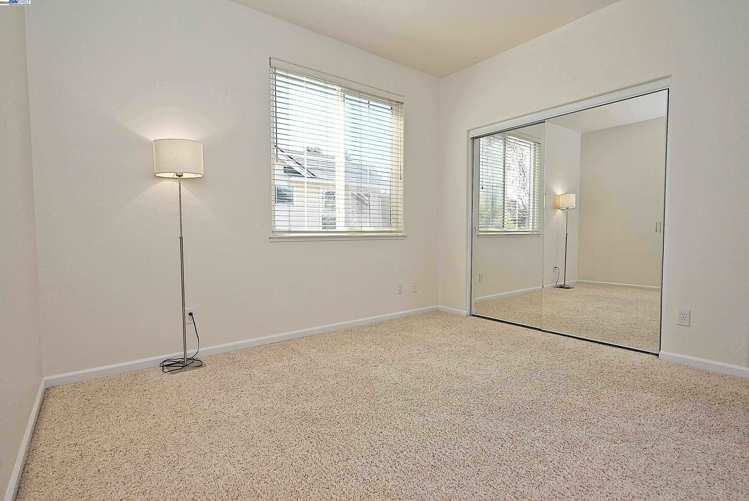 4189 Tessa Place Pleasanton, CA 94566 - Photo 25 of 41 an empty room with windows