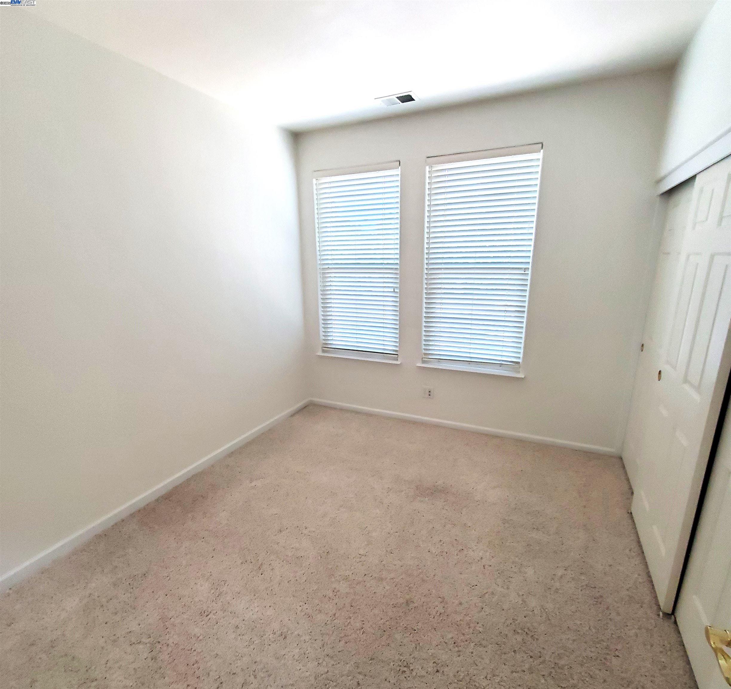 4189 Tessa Place Pleasanton, CA 94566 - Photo 31 of 41 an empty room with a window