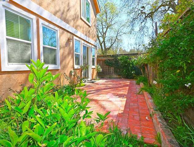 a backyard of a house with lots of green space