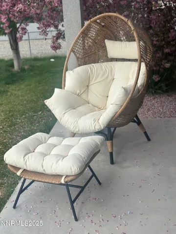 a view of backyard with seating space