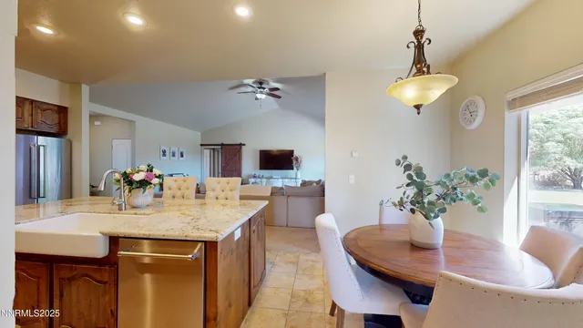 a spacious bathroom with a sink and a mirror