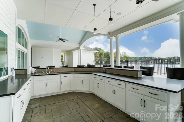 a front view of a house with swimming pool