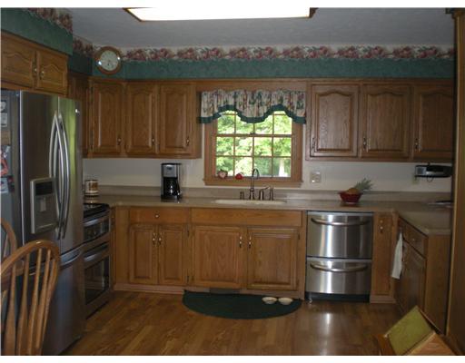 532 Meadow Road Burgettstown, PA 15021 - Photo 3 of 18 Kitchen. Updated eat-in-kitchen, corian counters, open to dining room