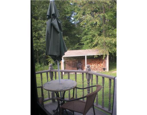 532 Meadow Road Burgettstown, PA 15021 - Photo 8 of 18 Patio/Deck. Small deck off the den/bedroom. View of wood shed on corner of property