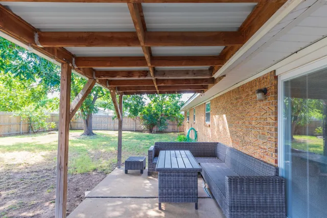 a view of backyard with green space
