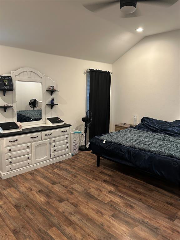 2631 Fish Tank Road Corsicana, TX 75110 - Photo 14 of 31 a bedroom with a bed and a dresser