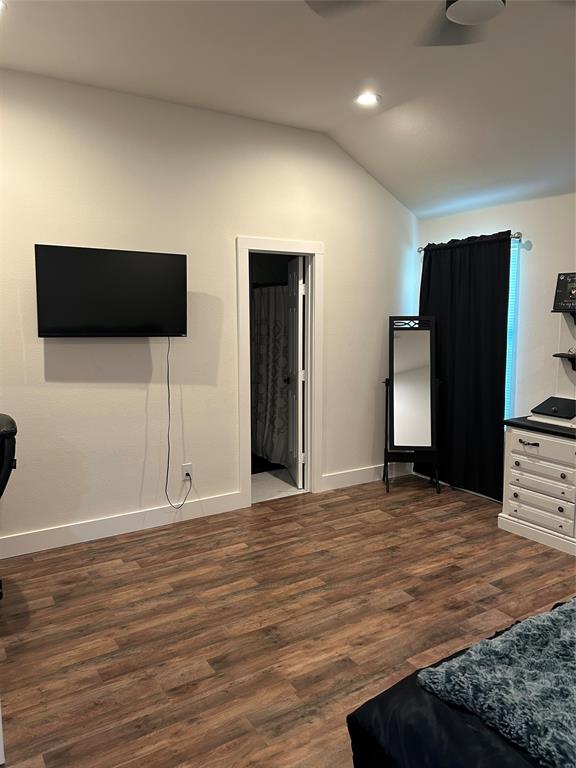 2631 Fish Tank Road Corsicana, TX 75110 - Photo 16 of 31 a view of an empty room with wooden floor and windows