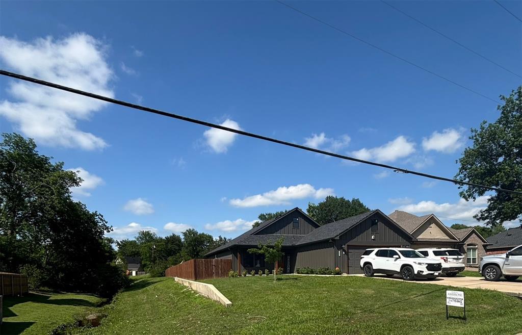 2631 Fish Tank Road Corsicana, TX 75110 - Photo 2 of 31 a front view of a house with a yard