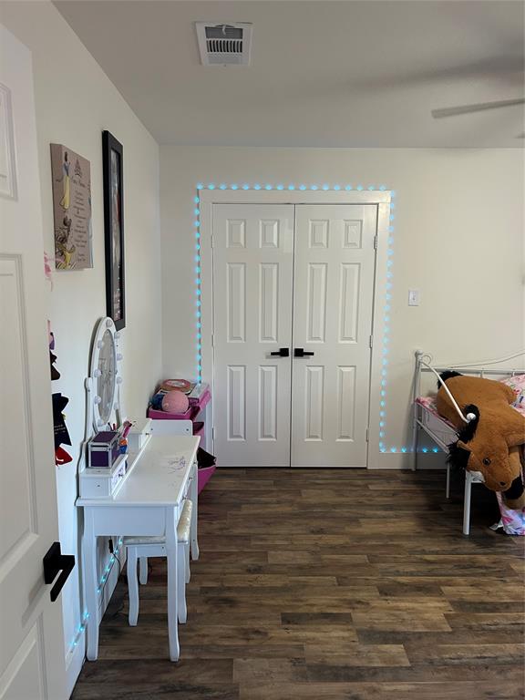 2631 Fish Tank Road Corsicana, TX 75110 - Photo 24 of 31 a workspace with furniture and wooden floor