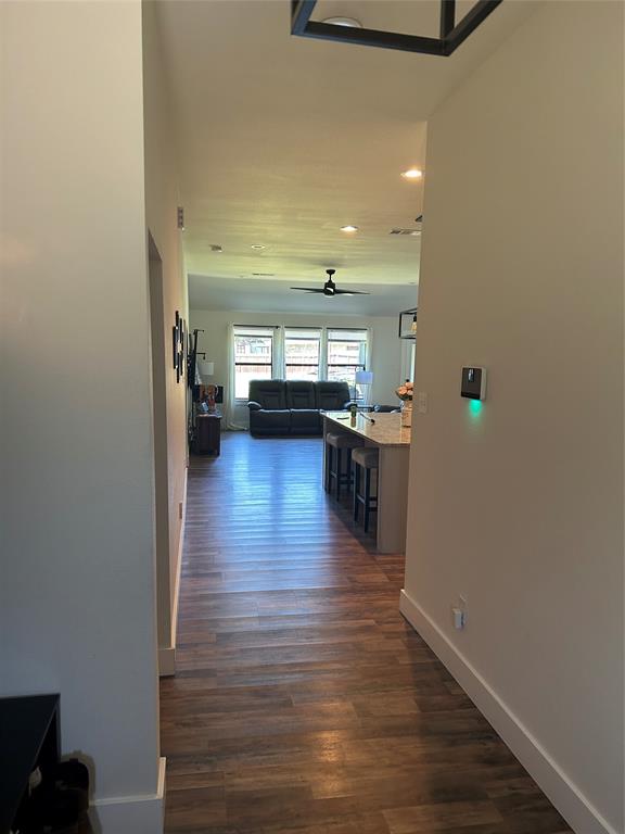 2631 Fish Tank Road Corsicana, TX 75110 - Photo 8 of 31 a view of a living room and kitchen with a sink