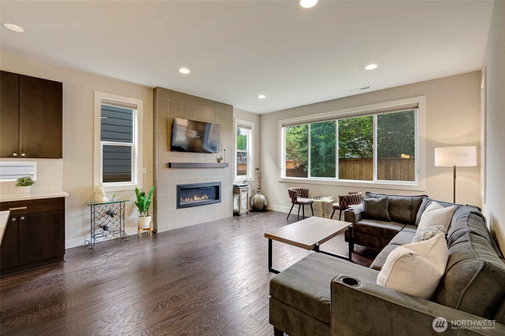 20025 6th Drive Southeast Bothell, WA 98012 - Photo 12 of 40 a living room with fireplace furniture and a large window