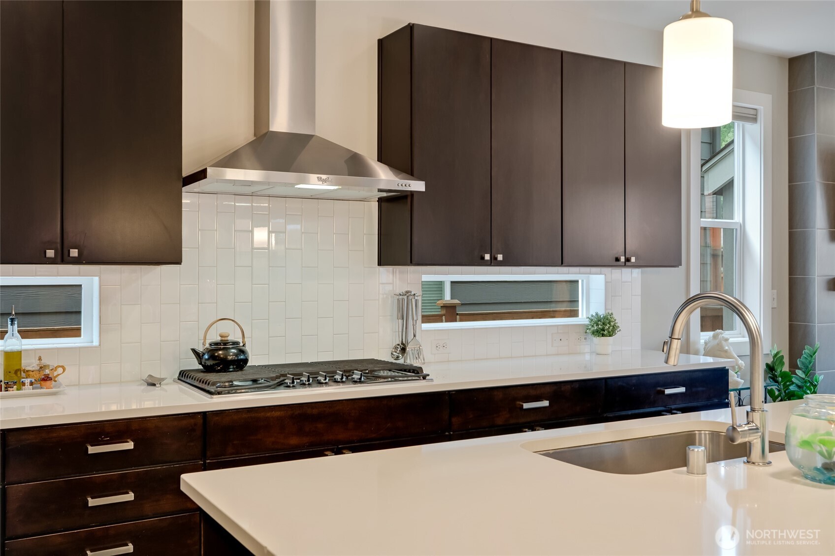 20025 6th Drive Southeast Bothell, WA 98012 - Photo 17 of 40 a kitchen with granite countertop a sink cabinets and stainless steel appliances