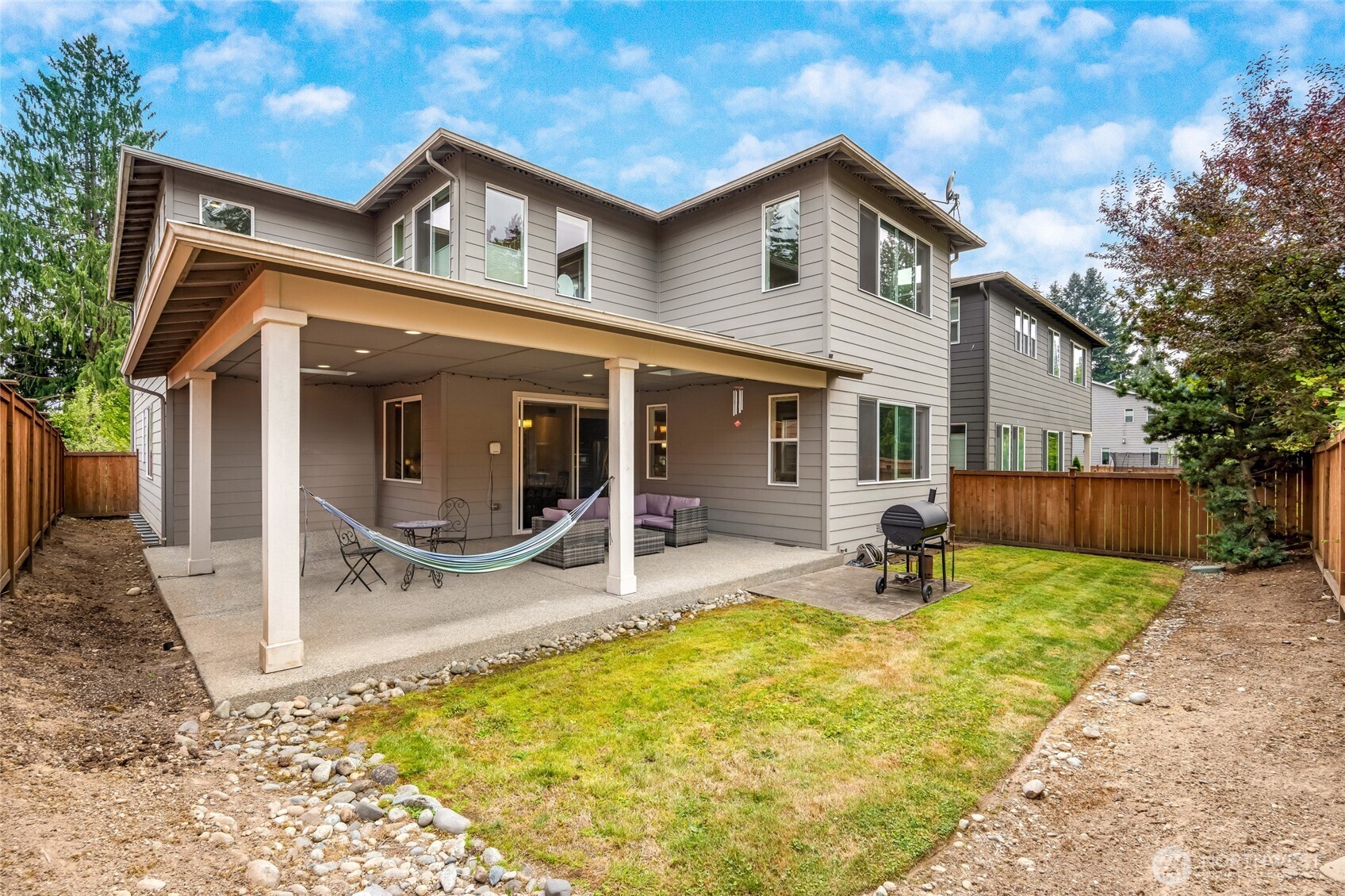 20025 6th Drive Southeast Bothell, WA 98012 - Photo 20 of 40 a front view of a house with patio and a yard