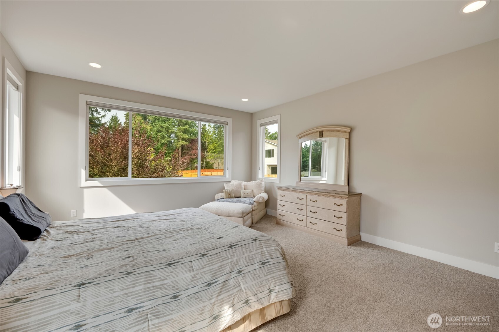 20025 6th Drive Southeast Bothell, WA 98012 - Photo 25 of 40 a bedroom with a large bed and a window