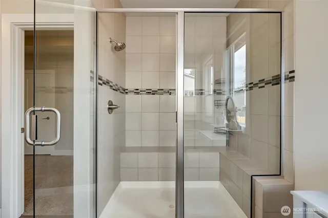 a bedroom with a bed and a desk