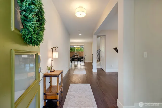 view of a hallway with seating space