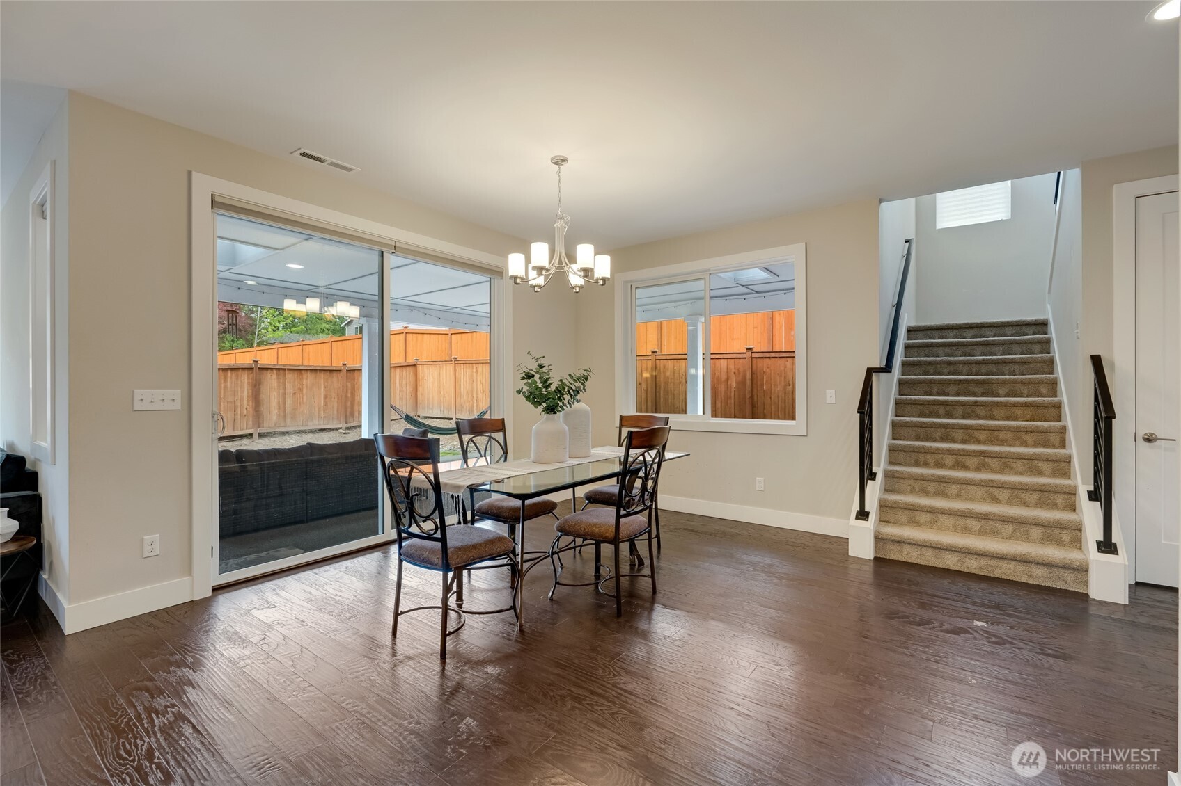 20025 6th Drive Southeast Bothell, WA 98012 - Photo 9 of 40 a view of a dining room with furniture and wooden floor