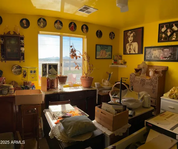 a room with furniture and screen