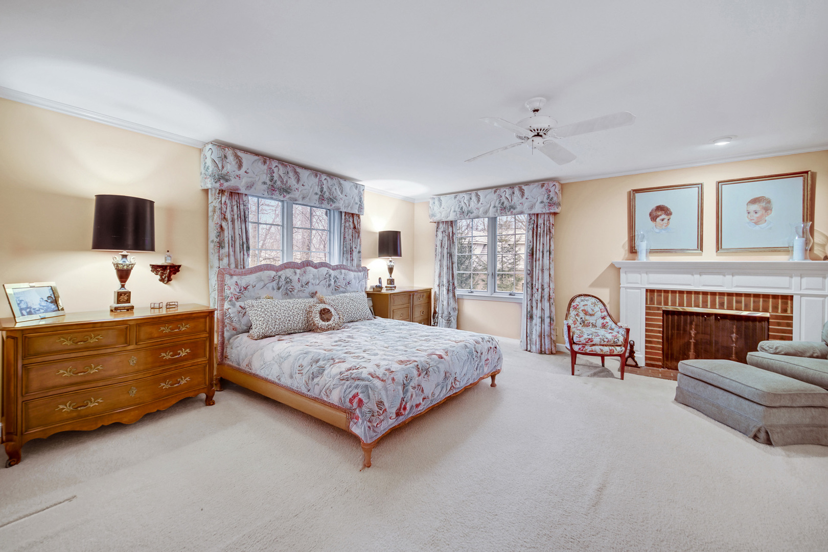 1380 Hampton Course St. Charles, IL 60174 - Photo 19 of 35 a spacious bedroom with a bed and a flat screen tv